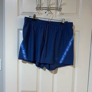 Blue Nike shorts size large